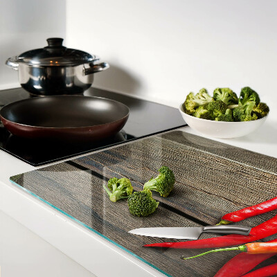 Chopping board Chili peppers on a wooden background