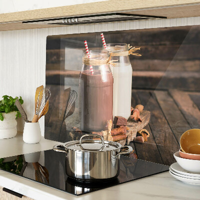 Glass chopping board Jars of drinks on a wooden background