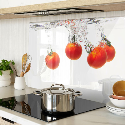 Glass chopping board Tomatoes in water