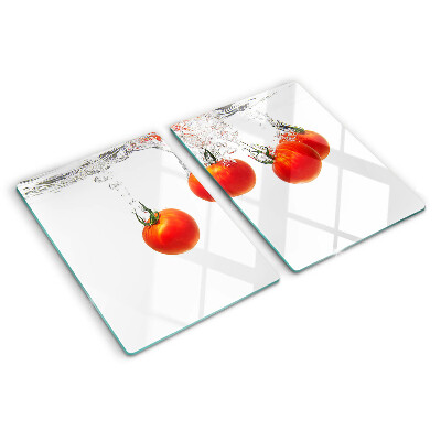 Glass chopping board Tomatoes in water
