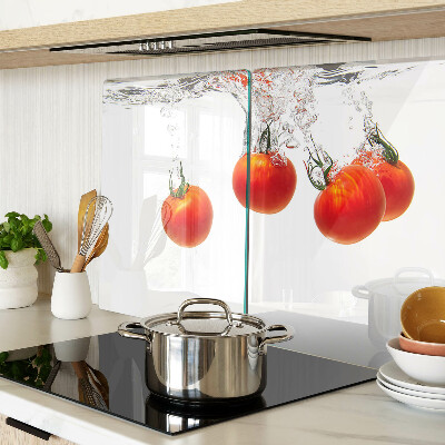 Glass chopping board Tomatoes in water