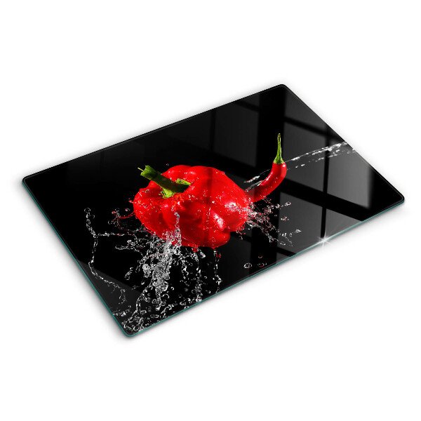 Glass kitchen board Red pepper in water