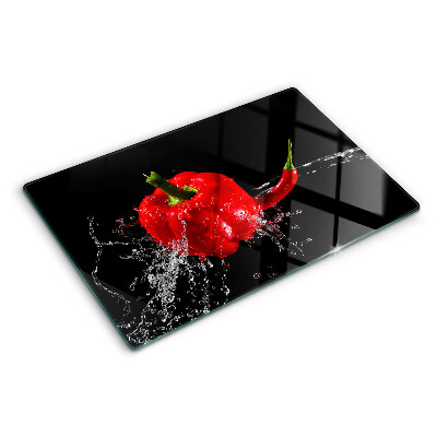 Glass kitchen board Red pepper in water