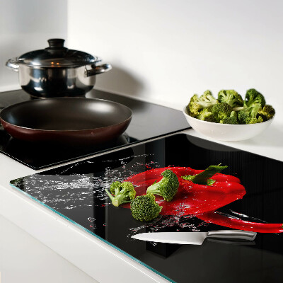 Glass kitchen board Red pepper in water