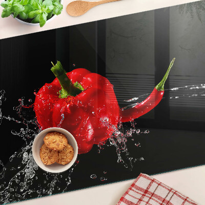 Glass kitchen board Red pepper in water