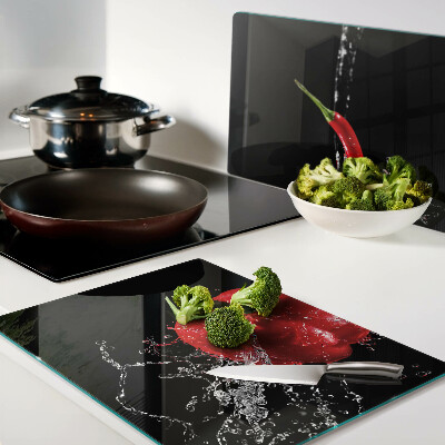 Glass kitchen board Red pepper in water