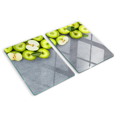 Cutting board Green apples on a gray surface