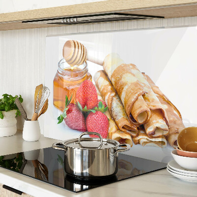 Glass cutting board Pancakes with honey and strawberries