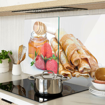 Glass cutting board Pancakes with honey and strawberries