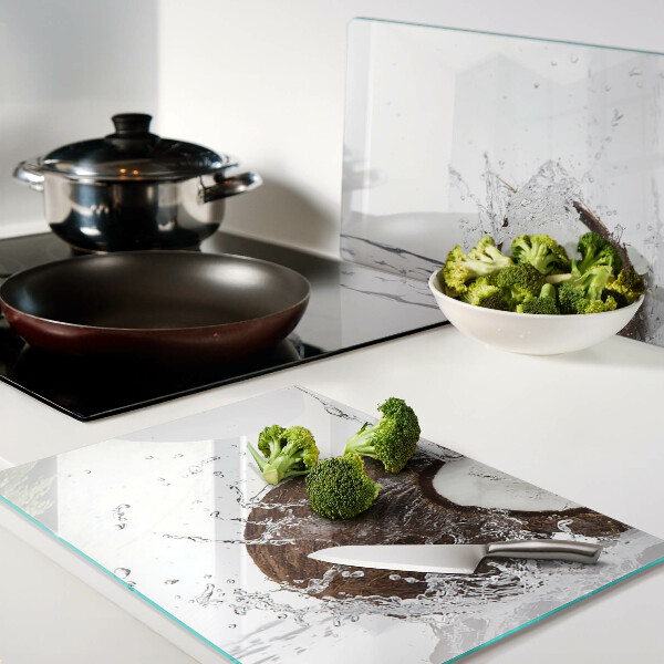 Glass kitchen board Coconut with water and splash