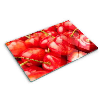 Glass kitchen board Cherries on a red background