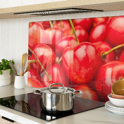 Glass kitchen board Cherries on a red background