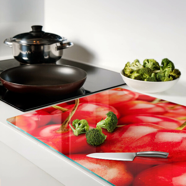 Glass kitchen board Cherries on a red background