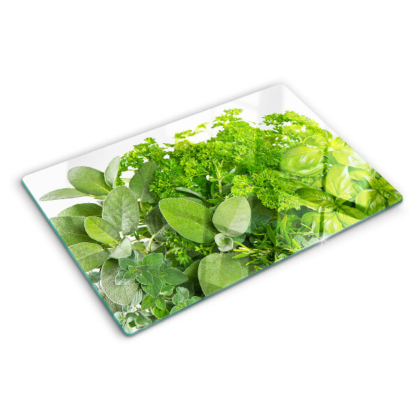 Chopping board glass Green herbs and leaves