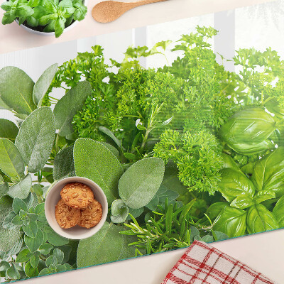 Chopping board glass Green herbs and leaves