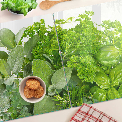 Chopping board glass Green herbs and leaves