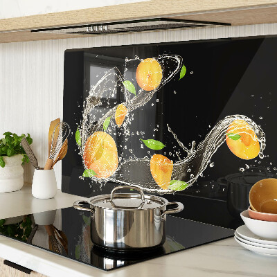 Glass cutting board Citrus fruits in water