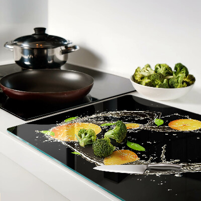 Glass cutting board Citrus fruits in water
