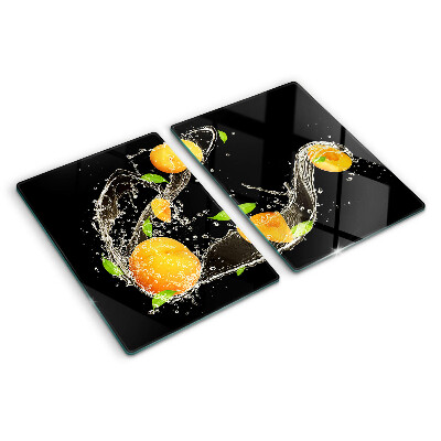 Glass cutting board Citrus fruits in water