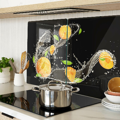Glass cutting board Citrus fruits in water