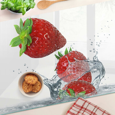 Chopping board glass Strawberries in water