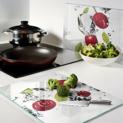 Glass kitchen board Red apples with ice