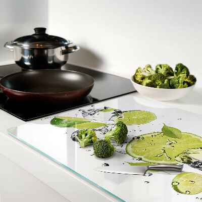 Glass chopping board Lemons and ice in water
