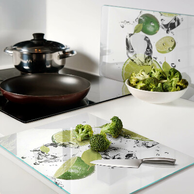 Glass chopping board Lemons and ice in water