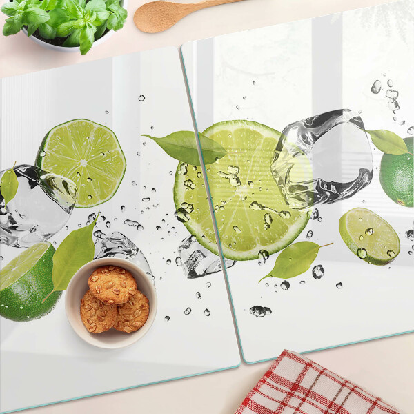 Glass chopping board Lemons and ice in water
