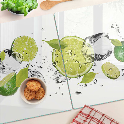 Glass chopping board Lemons and ice in water
