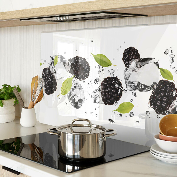 Glass cutting board Raspberries with leaves and drops of water