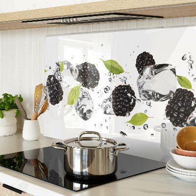 Glass cutting board Raspberries with leaves and drops of water