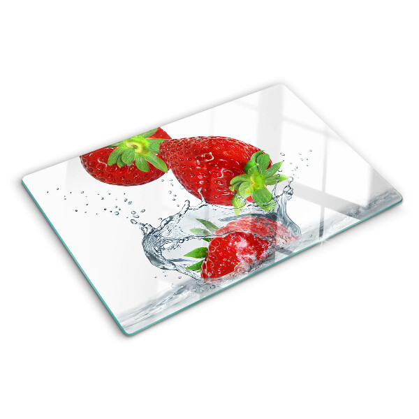 Chopping board glass Strawberries in water