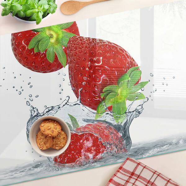 Chopping board glass Strawberries in water