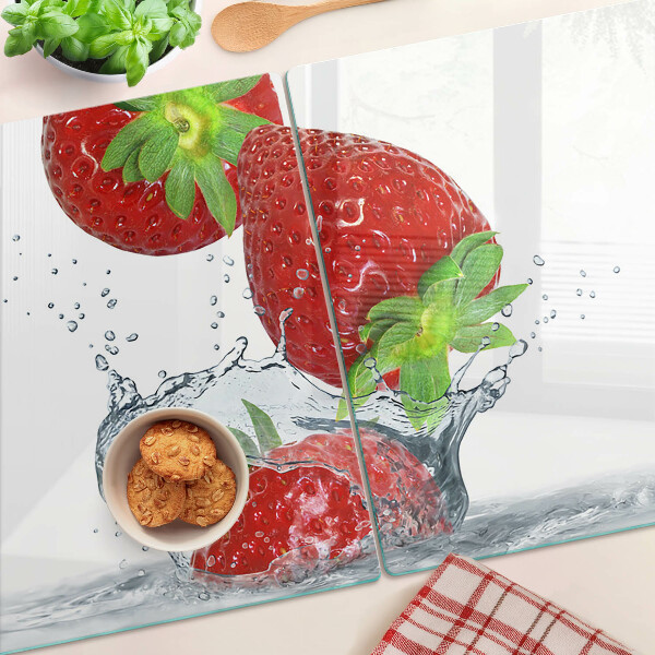 Chopping board glass Strawberries in water