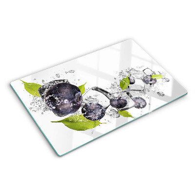 Glass kitchen board Plums in water with leaves