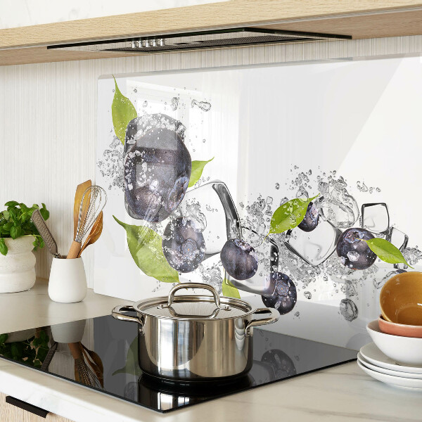 Glass kitchen board Plums in water with leaves