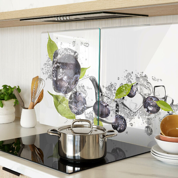 Glass kitchen board Plums in water with leaves