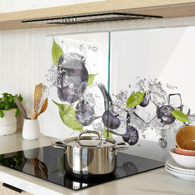 Glass kitchen board Plums in water with leaves
