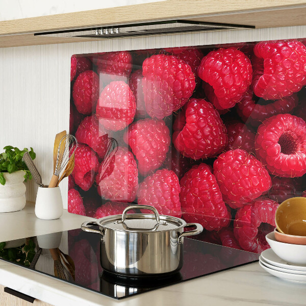 Chopping board Raspberries on the background