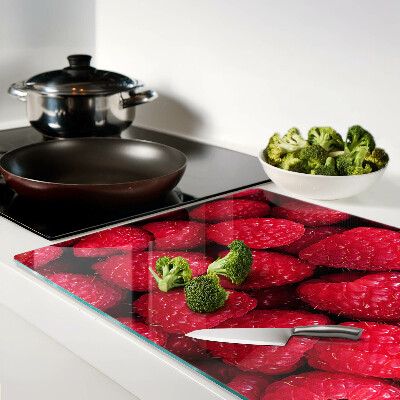 Chopping board Raspberries on the background