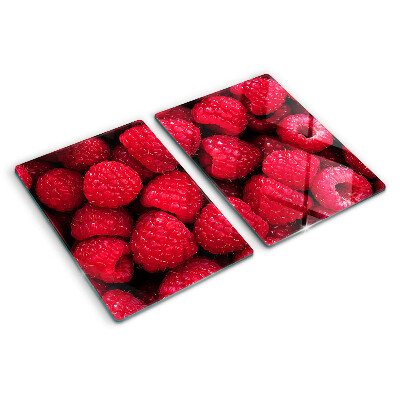 Chopping board Raspberries on the background