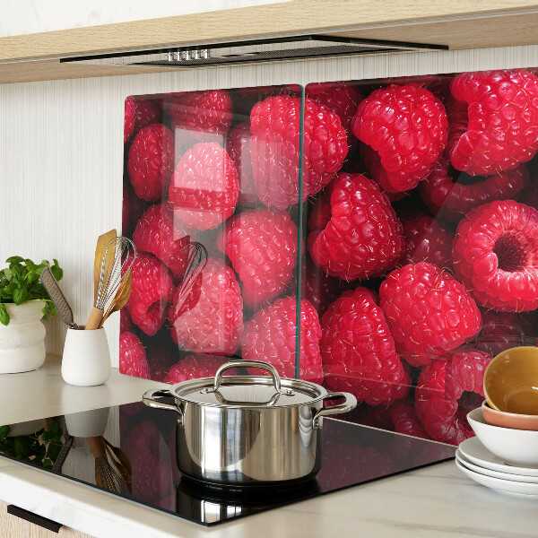 Chopping board Raspberries on the background