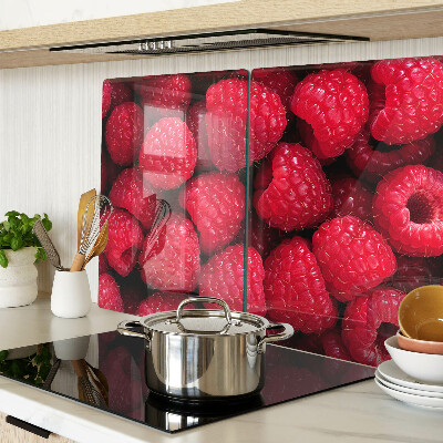 Chopping board Raspberries on the background