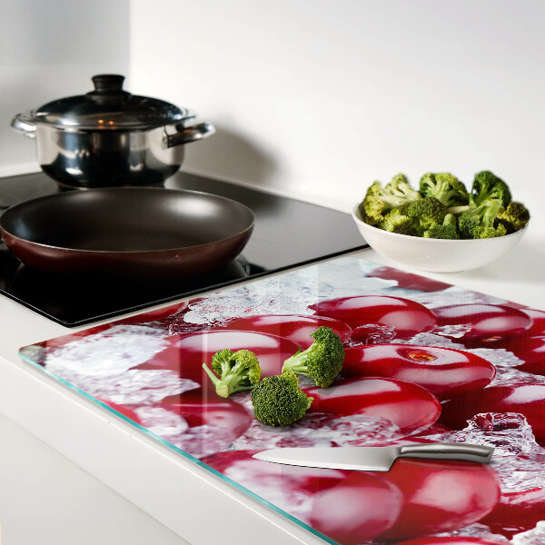 Chopping board glass Red grapes on ice