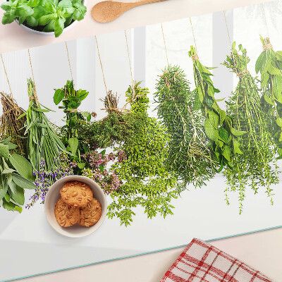 Glass cutting board Herbs hanging on a string