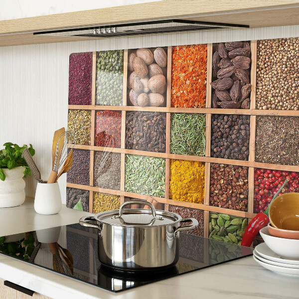 Glass kitchen board Spices in jars