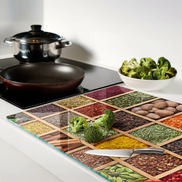 Glass kitchen board Spices in jars
