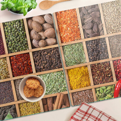 Glass kitchen board Spices in jars