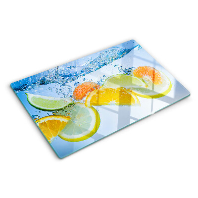 Chopping board glass Citrus fruits in water